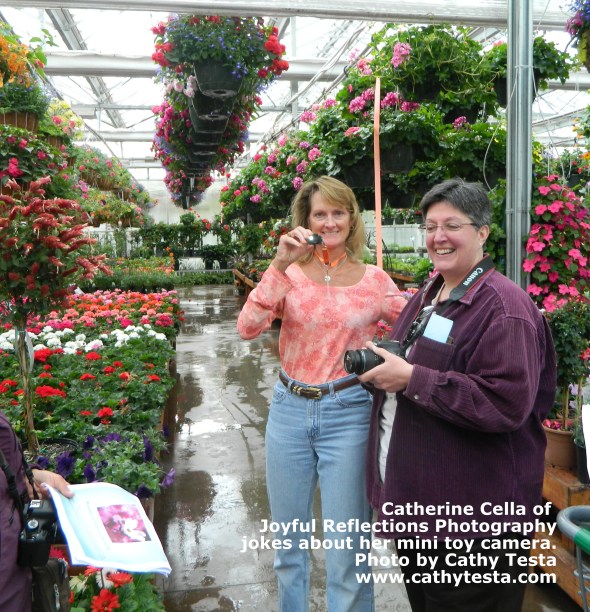 Catherine holding a toy camera - as a joke of course, with attendee Jo-Anne.