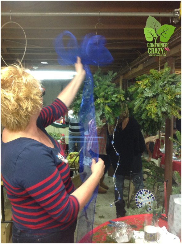 Renee works the blues - adding blue ribbons and blue lights